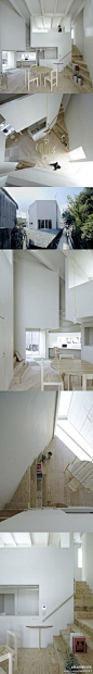 筑龙网建筑师圈：日本饭冢住宅，Rhythmdesign建筑事务所设计。日本的住宅总是很有意思，各种限制激发了建筑师无穷的想象。这个住宅呈现出六边形体，房间分布于整体空间的周边。这是一个两层的木头结构的住宅，住宅中心是一个木质餐桌，其他的所有房间都可以鸟瞰这个中心或是这个餐桌。http://t.cn/zOtVxTC