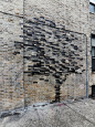 itscolossal: “Trees Grow from Bricks and a Storefront on the Streets of New York by Pejac ”