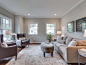 Transitional formal medium tone wood floor living room photo in DC Metro with gray walls and no tv