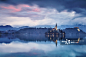 Slovenia, Upper Carniola, View of Lake of Bled with Assumption of Mary Pilgrimage Church at dawn