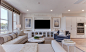 Example of a transitional open concept light wood floor and beige floor living room design in San Francisco with white walls and a wall-mounted tv
