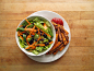 romaine salad with carrot, cucumber, black beans, and sesame ginger dressing, and baked sweet potato fries ketchup