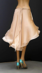 Belled skirt, looks nice and flowy. Chiffon over a lining, perfect for tango.:
