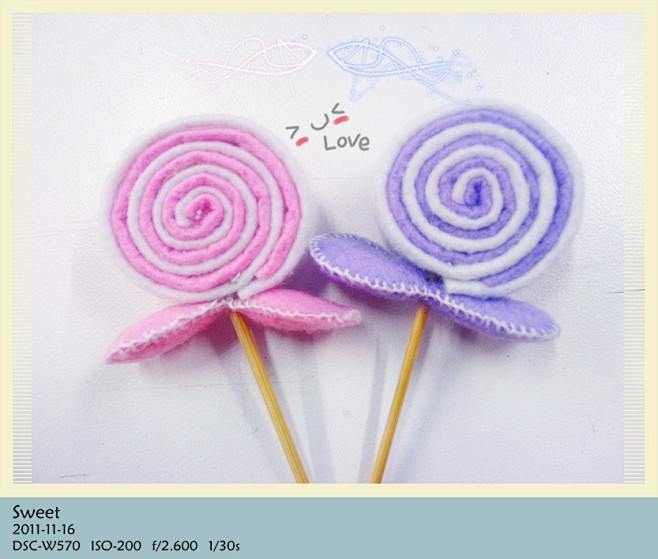 粉色和紫色的棒棒糖，用不织布和牙签做的，...