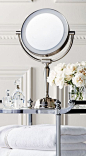 This LED-illuminated vanity mirror has a beautiful articulating head that adjusts to meet your specific height needs.