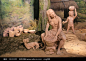 原始人制作陶器雕塑图片