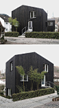 House Exterior Colors – 14 Modern Black Houses From Around The World / Two small black wood clad buildings make up this unique single family home.