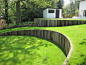 Curved timber retaining wall