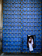 landscapelifescape:

Varadarajaswamy Temple, Kanchipuram, India
Photograph by Dinodia Dinodia, Photolibrary
A man steps through a doorway at the Varadarajaswamy Temple in Kanchipuram, “city of a thousand temples.” Kanchipuram is also known for silk saris—