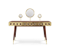 MONOCLES | DRESSING TABLE : A striking addition to your glamorous boudoir, Monocles dressing table has a mid-century feel and is constructed of solid walnut wood and offers three front drawers produced in gold plated brass. This retro table is supported b