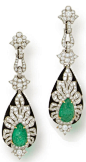 A pair of carved emerald, diamond and onyx pendant earrings  each designed as cascade of stylized floral and foliate round brilliant-cut diamond elements, suspending a carved pear-shaped emerald cabochon surrounded by round brilliant-cut diamonds and cali