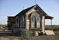 Made from 95% salvaged materials, the Arched Zebu is a tiny prairie house from Texas Tiny Houses. Measuring 12- by 18-feet, the house is built from materials that are close to 200 years old. Featuring beautiful arched windows, the cottage includes a lofte