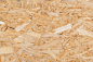 Oriented strand board. chipboard building materia background Premium Photo