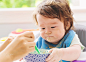 Happy little baby boy eating food by Michiko Tierney on 500px