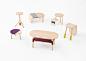 Japanese studio Nendo has dressed up these wooden tables for Walt Disney Japan to look like characters from children's story books Winnie-the-Pooh.