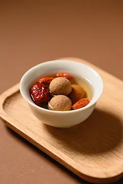 桂圆红枣枸杞茶摄影图