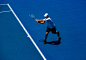 A man playing tennis in Australia