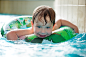 Danil Roudenko在 500px 上的照片Young boy in inflatable tube swimming