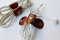 Brown leather  cable organizer : This listing for 1 item.    This handmade item can be used to organize headphone, ear bud, and other small cables.    Made of 100% genuine cow