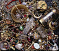 Selection of items from the Cheapside Hoard. The Cheapside Hoard was uncovered by workmen during demolition work at 30-32 Cheapside in 1912. The three tenements had been the property of the Worshipful Company of Goldsmiths for centuries. The hoard was dis