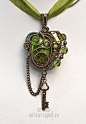 Warm green steampunk heart with key