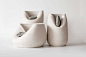 martín azúa warps ceramic vases with raw stones:
