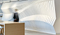 Taking the idea of progression and evolution, a super-sized sculptural wall was designed by the THERE team that, while static, conveyed the idea of “constant change.”
