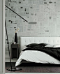 wallpaper ideas: newspaper + black + white bedroom