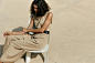 Sleeveless jumpsuit with square-cut neckline