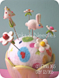 Cute pincushion with adorable pins... I'm not sure where you'd get them all:)