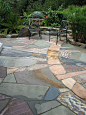 Much better than stamped concrete or traditional flagstone layout