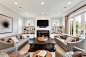 Living room - transitional dark wood floor and brown floor living room idea in Chicago with white walls, a standard fireplace, a metal fireplace and a wall-mounted tv