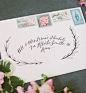 Vintage stamps and proper paper specification are the perfect way to continue the overall theme and color palette in an invitation suite.