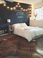 Chalkboard wall with string lights...love this idea for Drew's room in our next house.