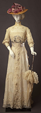 Day dress with lace applications, by Sartoria Ida Giraldi Masolini, Florence, c. 1910, at the Pitti Palace Costume Gallery. Via Europeana Fashion.: