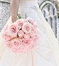 Close up of Hispanic bride holding bouquet of roses by Gable Denims on 500px