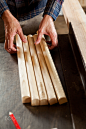 Man taking a pieces of wood by Implementar on 500px