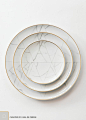 An unexpected dinnerware line created by French designer Coline le Corre. A refined, geometric approach, inspired by the noble marble of Carrara.        * Dinner Plate (11”)     * Salad/Dessert Plate (8.75")     * Bread Plate (6.4”)