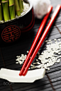 Chopsticks and a lucky bamboo plant : Chopsticks and a lucky bamboo plant - oriental style table serving concept