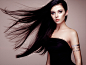 Fashion portrait of elegant woman with magnificent hair by Oleg Gekman