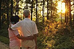 Senior Couple Looking at Sunset