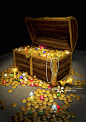 Gold coins and jewels spilling from treasure chest_创意图片