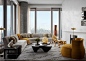 Image may contain Furniture Living Room Indoors Room Table Couch Coffee Table Rug Wood and Flooring