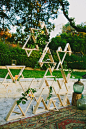 triangle shelf wall, photo by Amber Vickery Photography http://ruffledblog.com/late-summer-bohemian-inspiration #weddingideas #backdrops