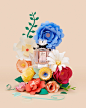 Flora by Gucci | Papercrafted flowers : 2 images we shot featuring the perfume Flora by Gucci surrounded by papercrafted flowers.