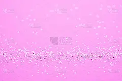 节日背景与小闪亮的火花在明亮的粉红色背景。圣诞，新年或生日派对背景为您的项目