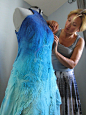Nika Ivanoff, felter, putting finishing touches on felt dress. For more fiber art content, join the FiberArtNow.net tribe.