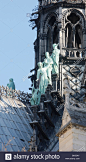 statues-of-three-apostles-at-the-foot-of-notre-dame-de-paris-cathedral-BK55AY.jpg (740×1390)