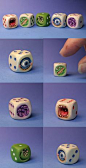 Monster Dices you can buy them here: http://www.maow-miniatures.fr/figurines.htm