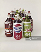 Cold drink and beer bottles on white background_创意图片